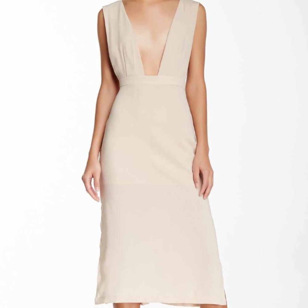 Low neckline nude dress